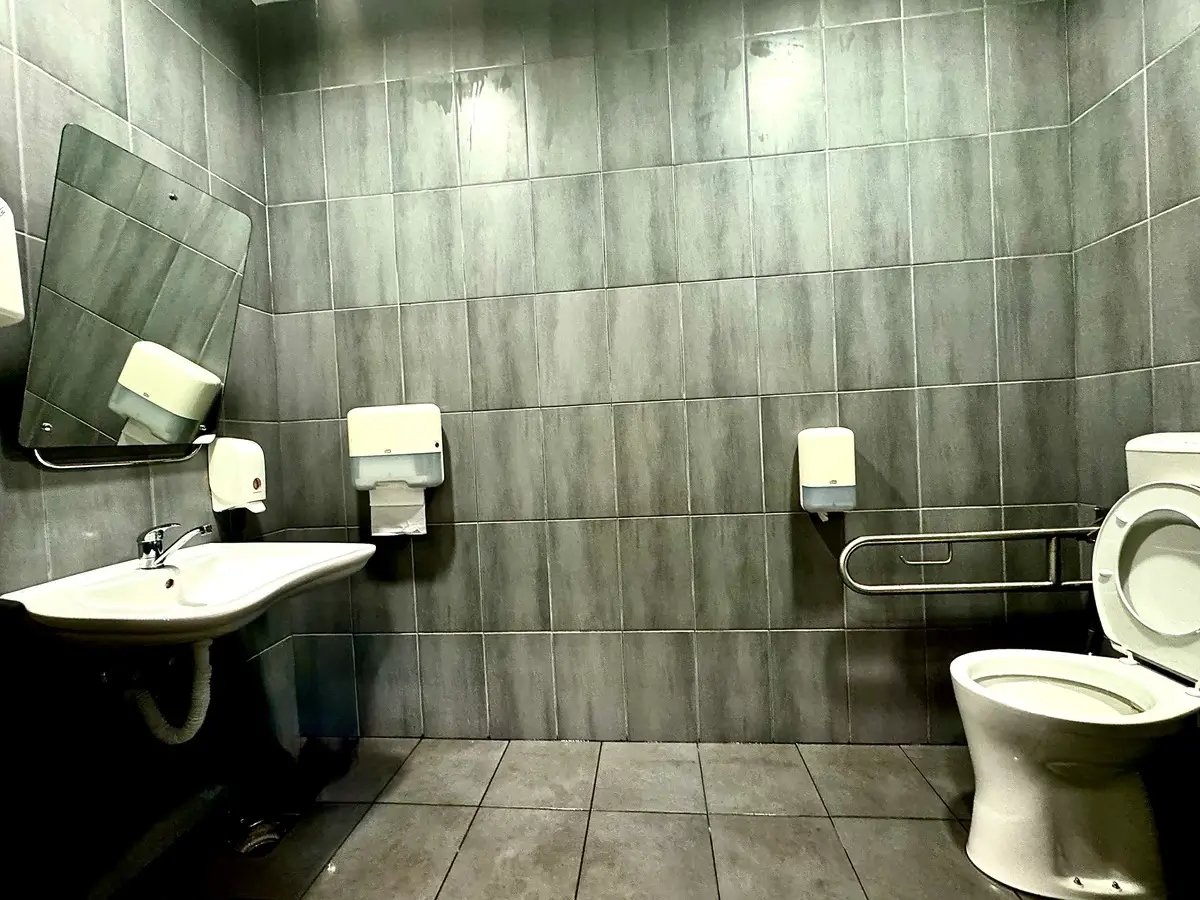 Spacious accessible restroom interior showing maneuvering space